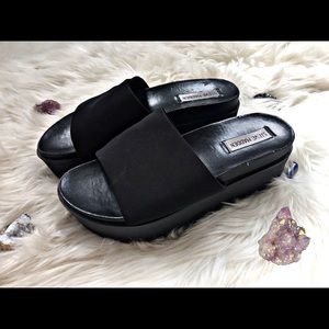 Steve Madden Black Slip-on Platforms
